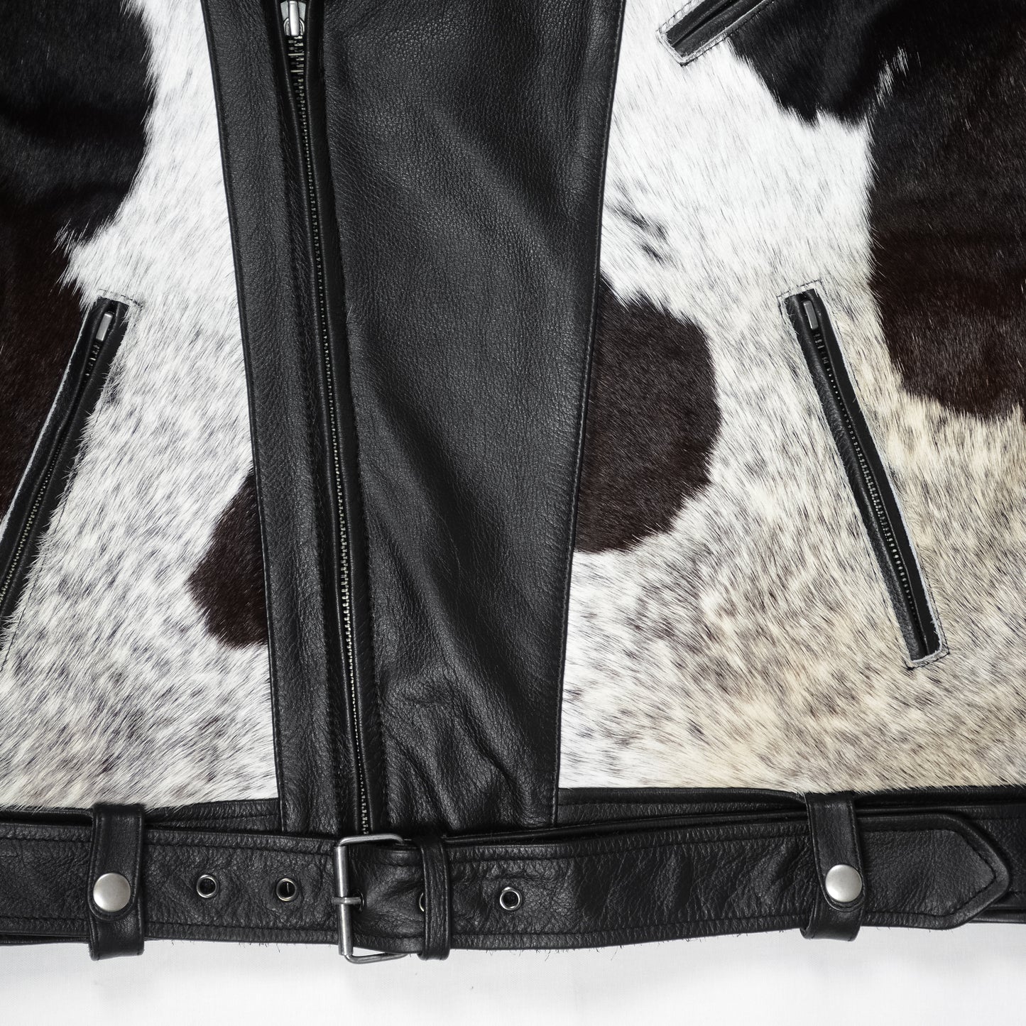 Close-up of hair-on cowhide panels on moto jacket